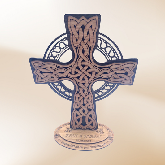 Black and Brown Celtic Cross sitting on a personalised wedding day base